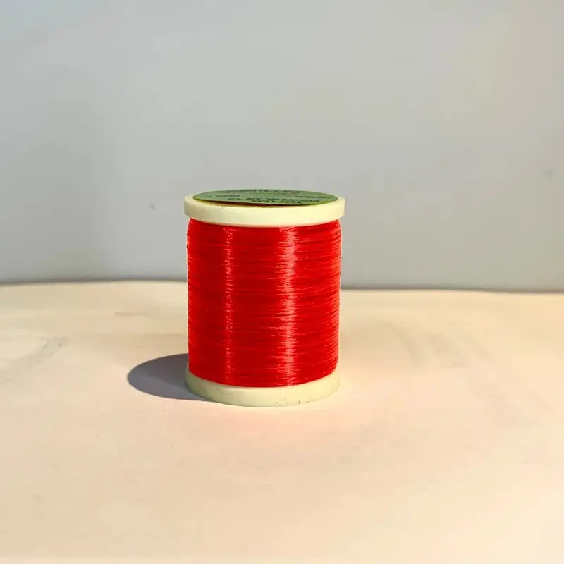 Hareline Danville Flat Waxed Nylon Thread – Fluorescent Fire Orange, 210 Denier